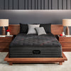 The Beautyrest Black deluxe c-class firm mattress in a bedroom ||series: deluxe c-class|| feel: firm