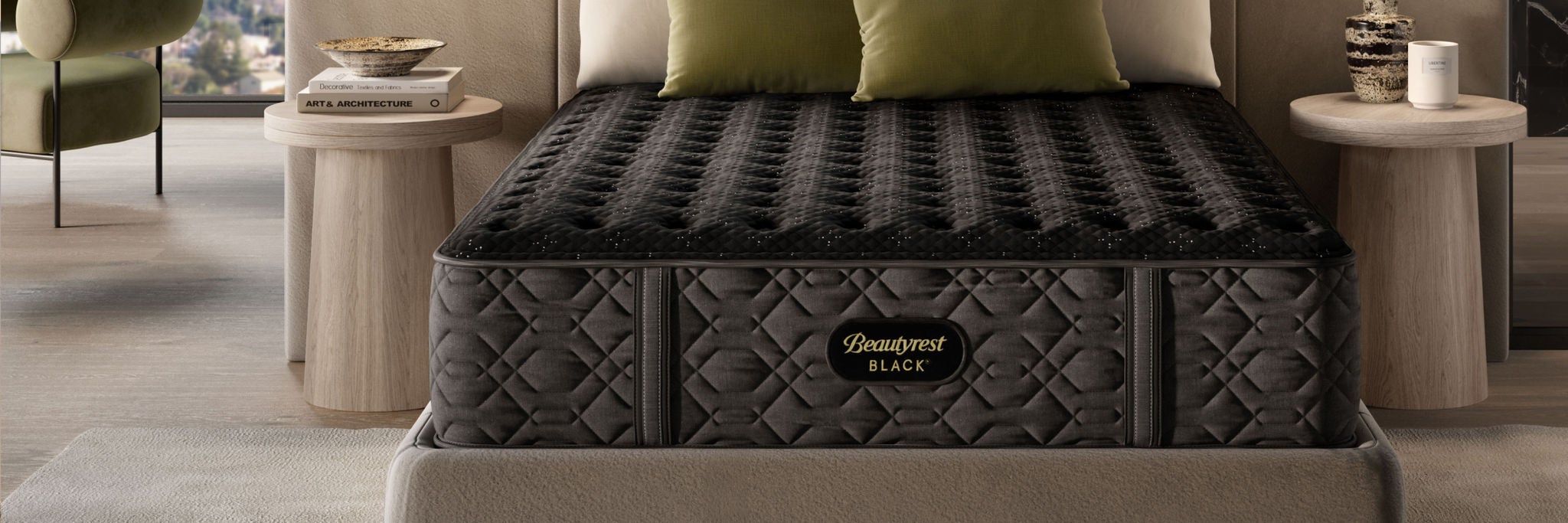 Beautyrest Black mattress sitting in a great bed frame with 4 pillows on top of it.