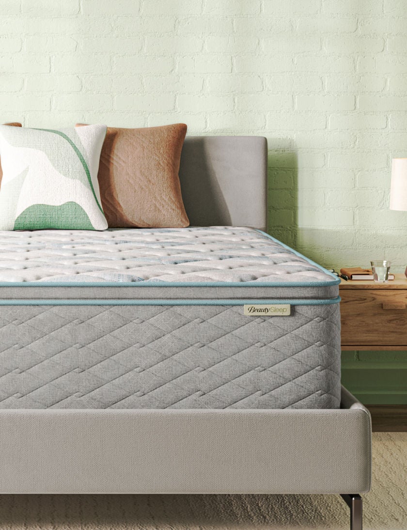 Beautysleep Soothing Nights mattress in a grey bedframe with 2 pillows on top