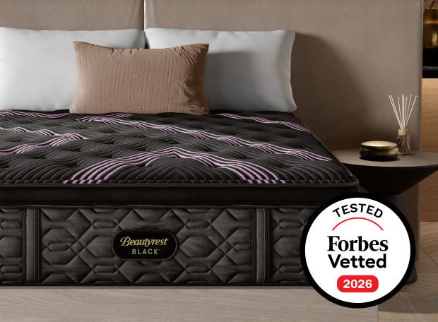 Beautyrest Black mattress in a bedroom with an award badge from Forbes