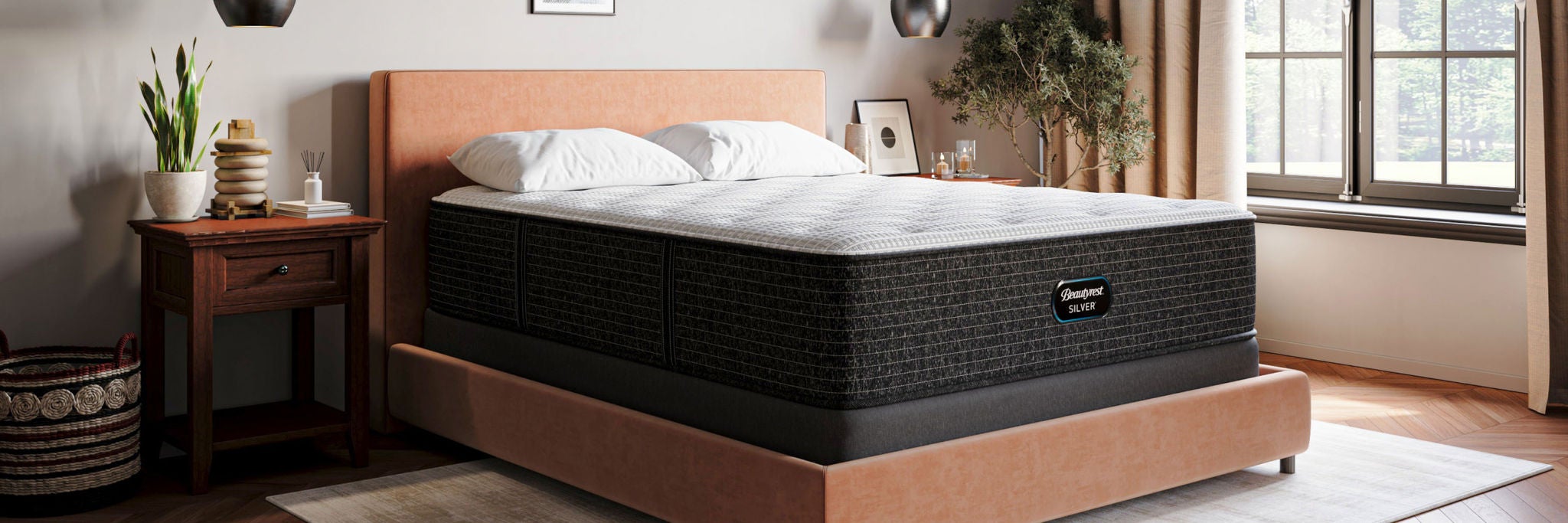 Beautyrest BR 26 mattress sitting on top of a box foundation in a brown bed frame.