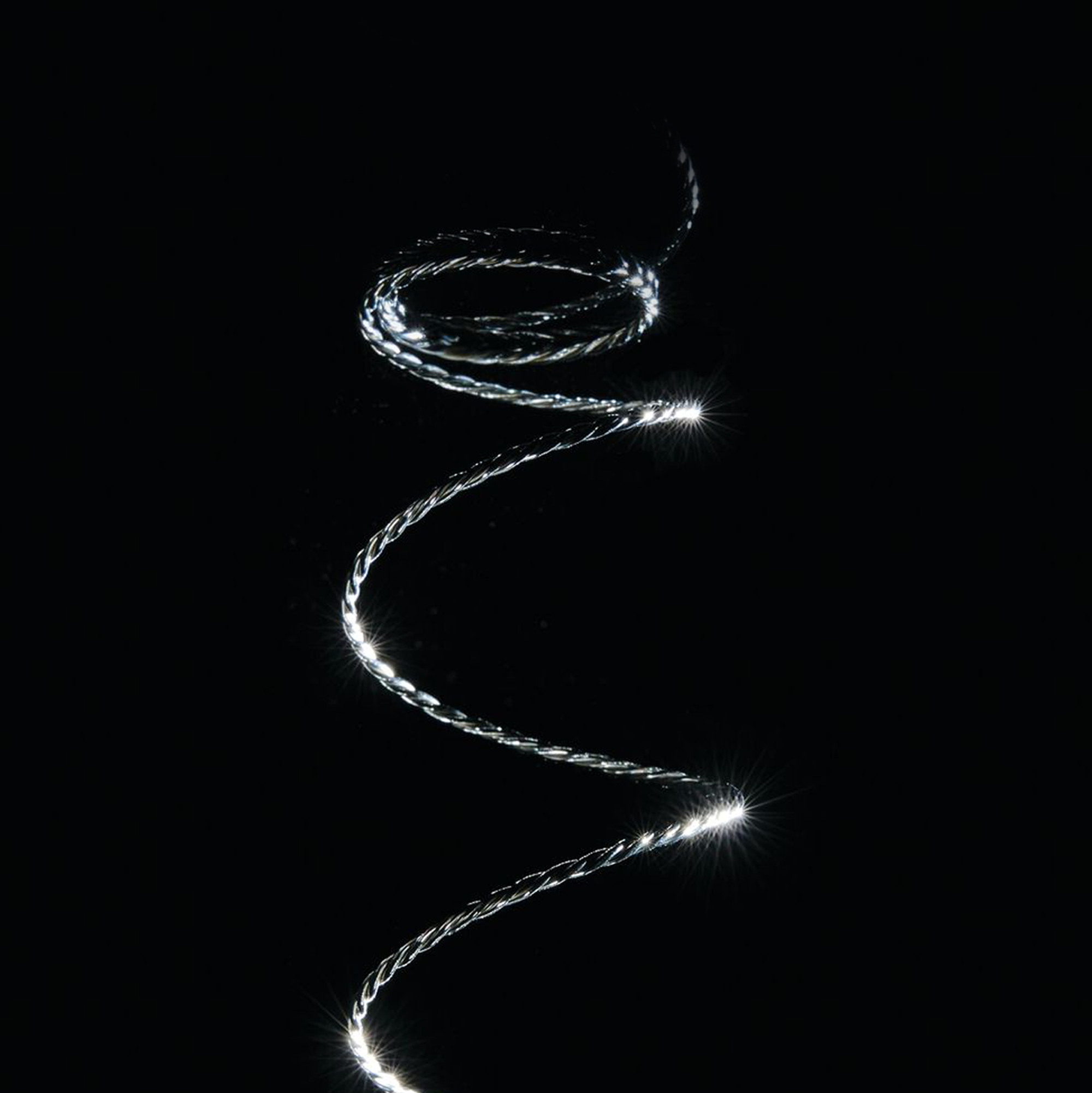 Spiral of glowing silver wire