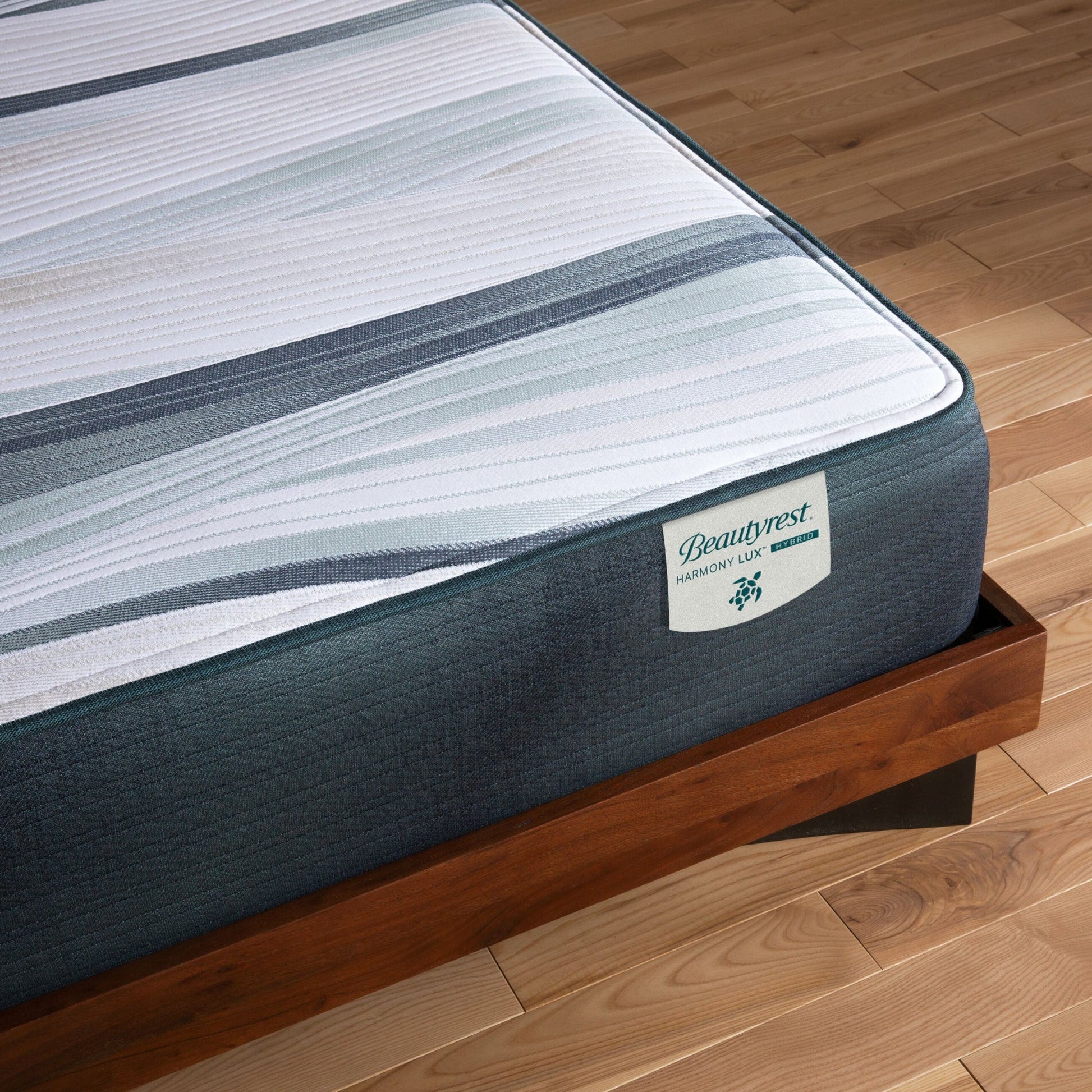Corner view of the Beautyrest Harmony Lux Hybrid mattress in a bedroom || series: Exceptional Seabrook Island || feel: firm