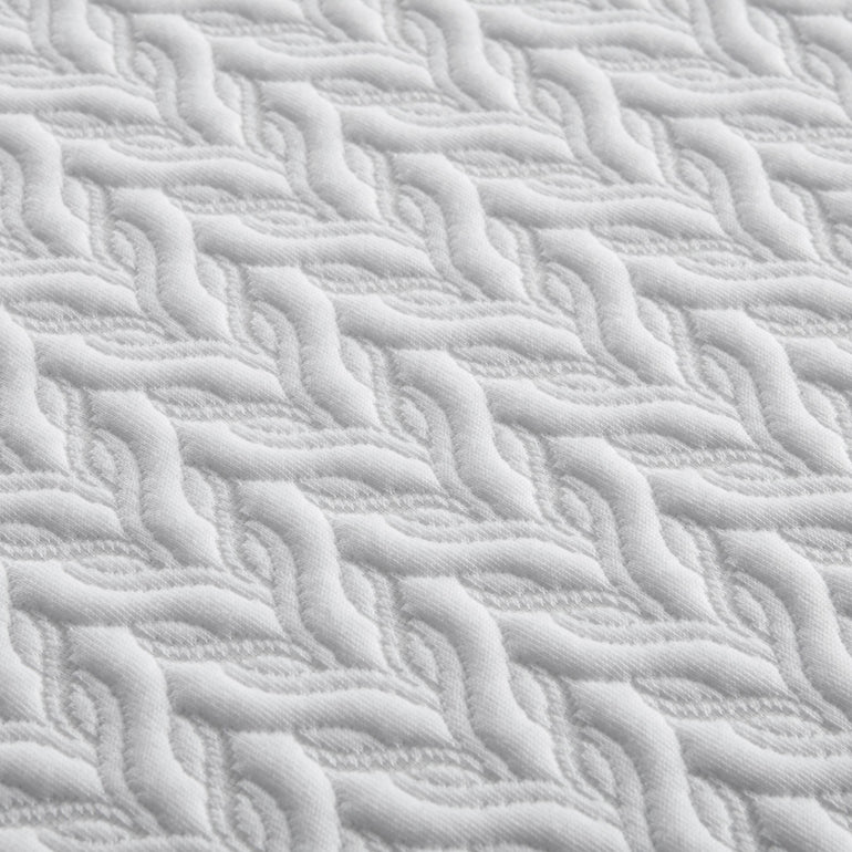 Close-up view of the material on the Beautyrest Select hybrid mattress ||feel: Firm