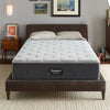 The Beautyrest Silver BRS900 Plush mattress in a bedroom on a brown bed