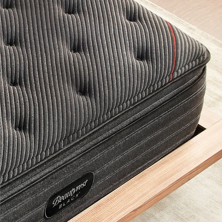 Corner view of the Beautyrest Black deluxe c-class mattress ||series: deluxe c-class|| feel: medium pillow top