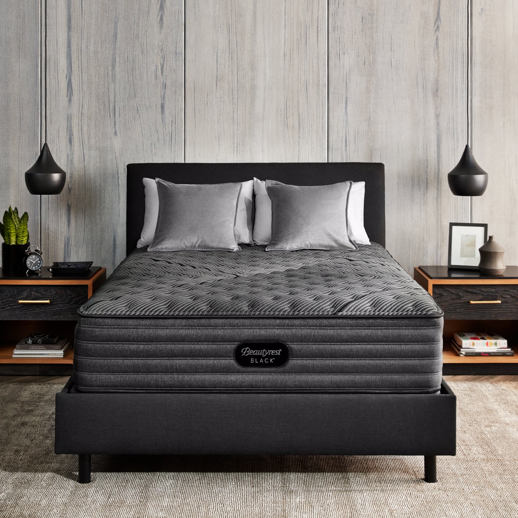 The Beautyrest Black enhanced l-class firm mattress in a bedroom|| series: enhanced l-class || feel: firm