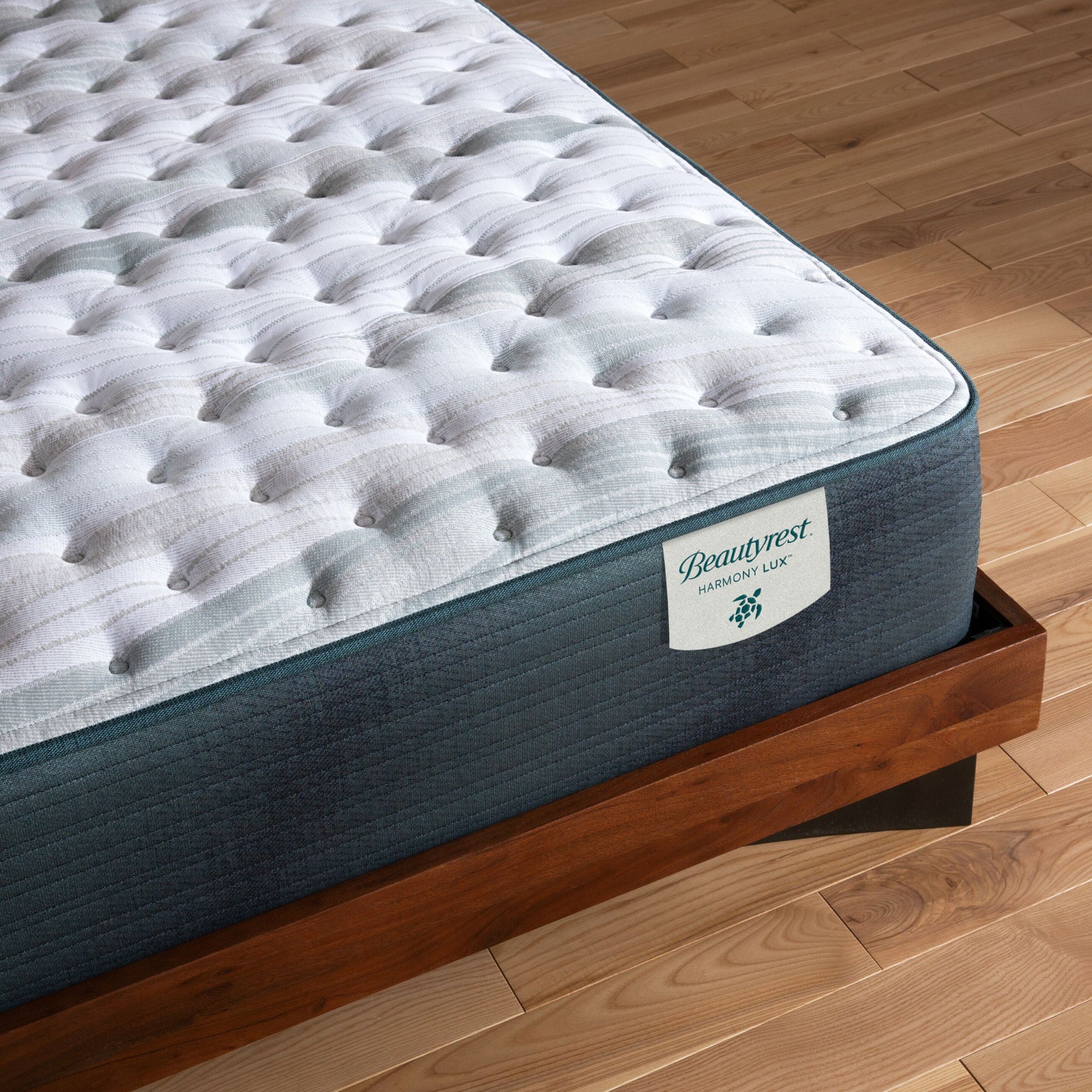 Corner view of the Beautyrest Harmony Lux mattress in a bedroom || series: Premier Anchor Island || feel: firm