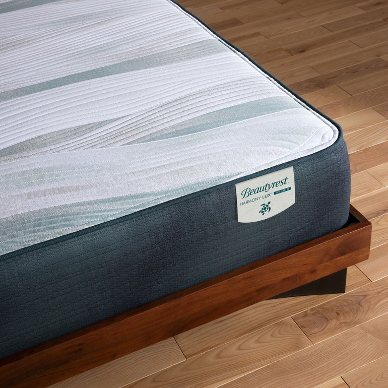 Corner view of the Beautyrest Harmony Lux Hybrid mattress in a bedroom || series: Premier Ocean View Island || feel: plush