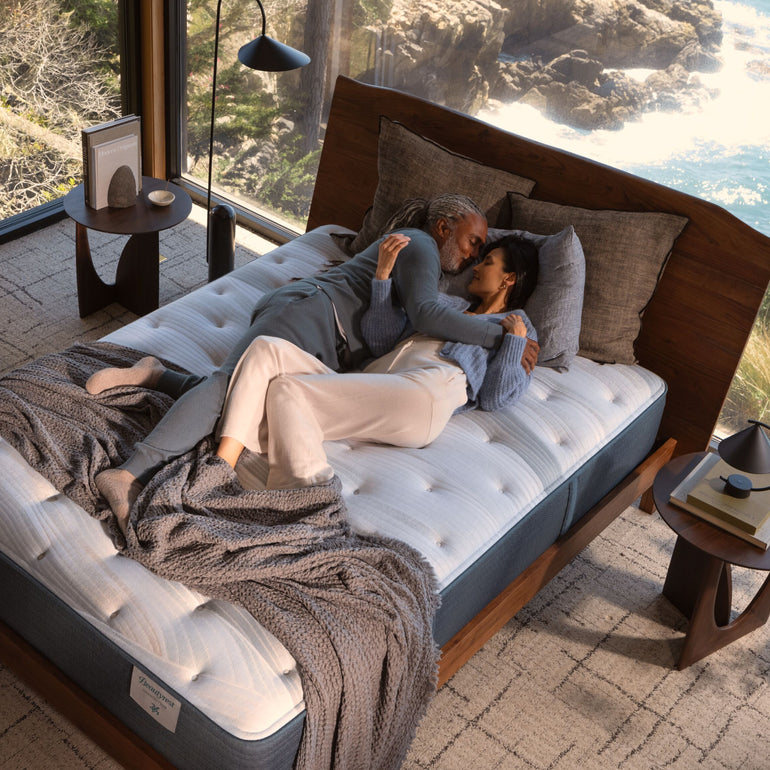 Man and woman sleeping in a bedroom on the Beautyrest Harmony Lux mattress || series: Premier Anchor Island || feel: medium pillow top