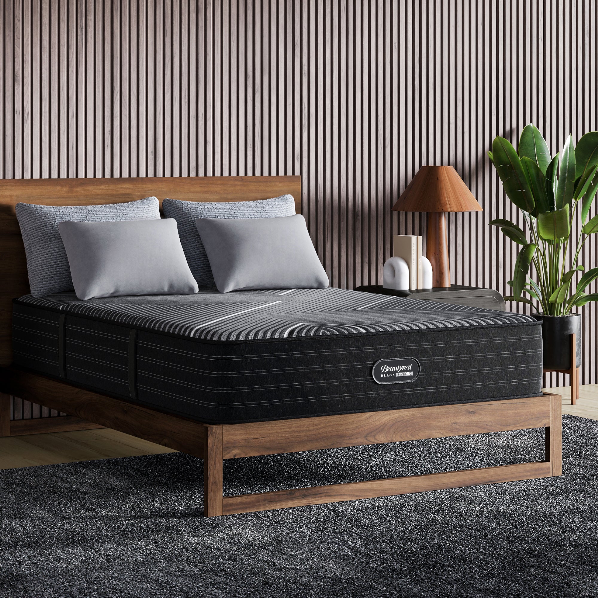 The Beautyrest Black hybrid mattress in a bedroom on a wooden bed || series: grand bx-class || feel: plush