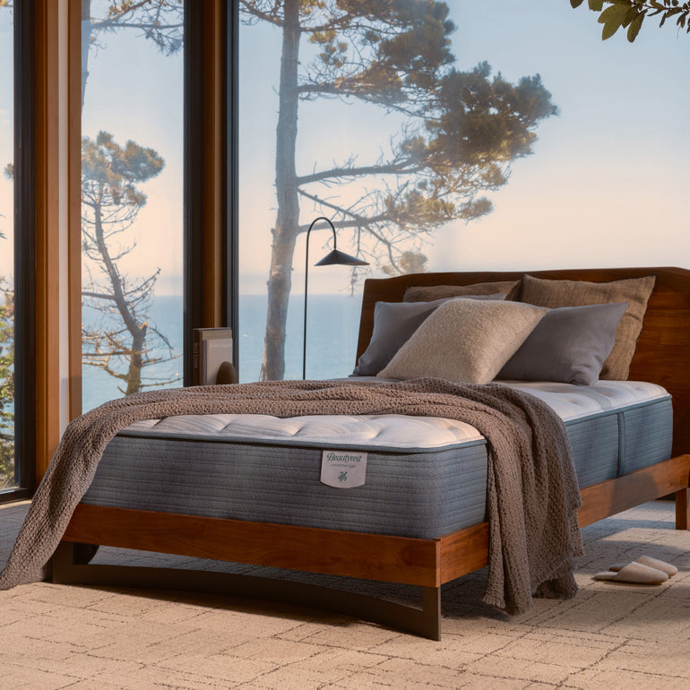 The Beautyrest Harmony Lux mattress in a bedroom by the ocean|| series: Premier Anchor Island || feel: medium pillow top