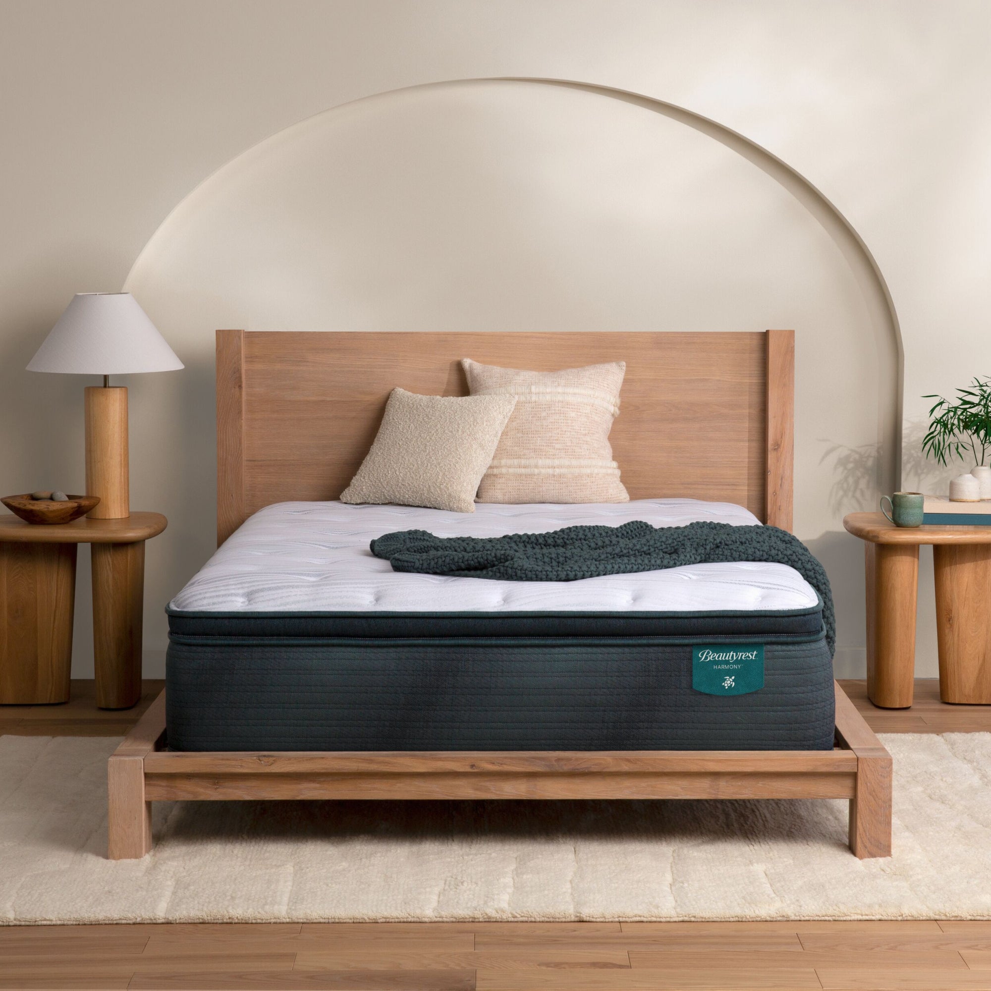 The Beautyrest Harmony plush pillow top mattress in a bedroom on a wooden bed|| series: Exceptional Cypress Bay || feel: plush pillow top