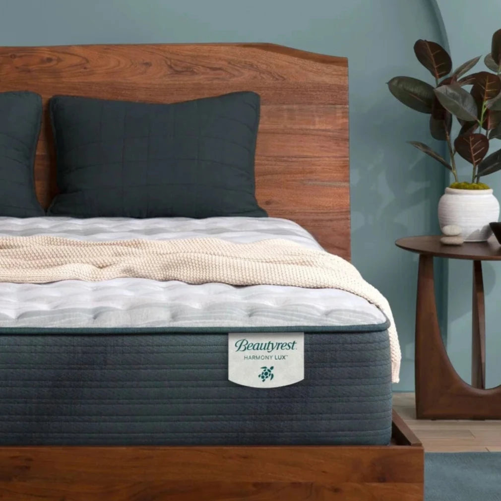 Corner shot of a Beautyrest Harmony Lux mattress in a bedroom