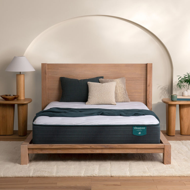 The Beautyrest Harmony plush mattress in a bedroom on a wooden bed || series: Premier Beachfront Bay || feel: plush