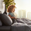 Woman waking up in a Beautyrest Black mattress||series: enhanced l-class