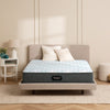 The Beautyrest PressureSmart mattress in a bedroom || feel: firm || series: standard