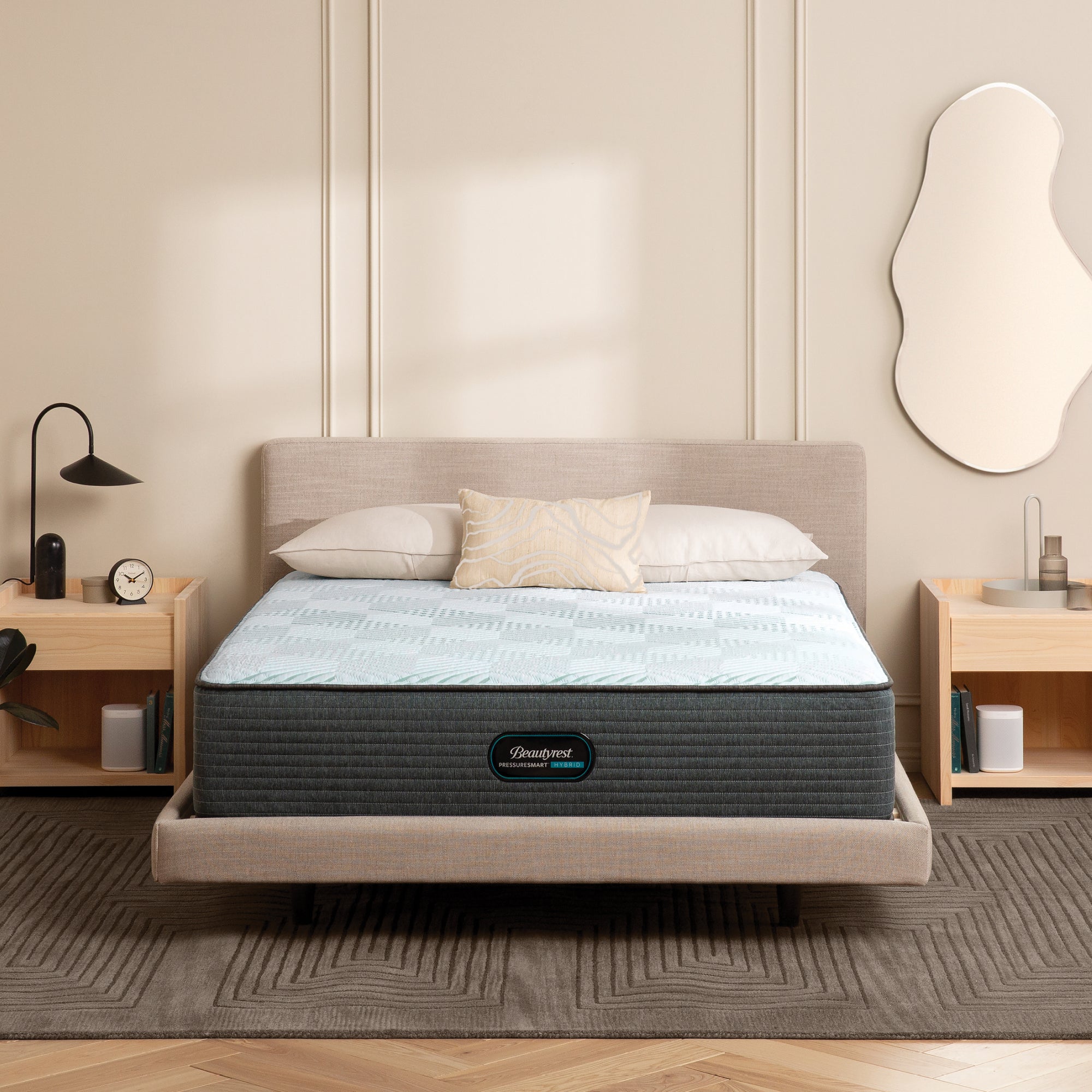 The Beautyrest PressureSmart mattress in a bedroom||feel: firm||series: hybrid