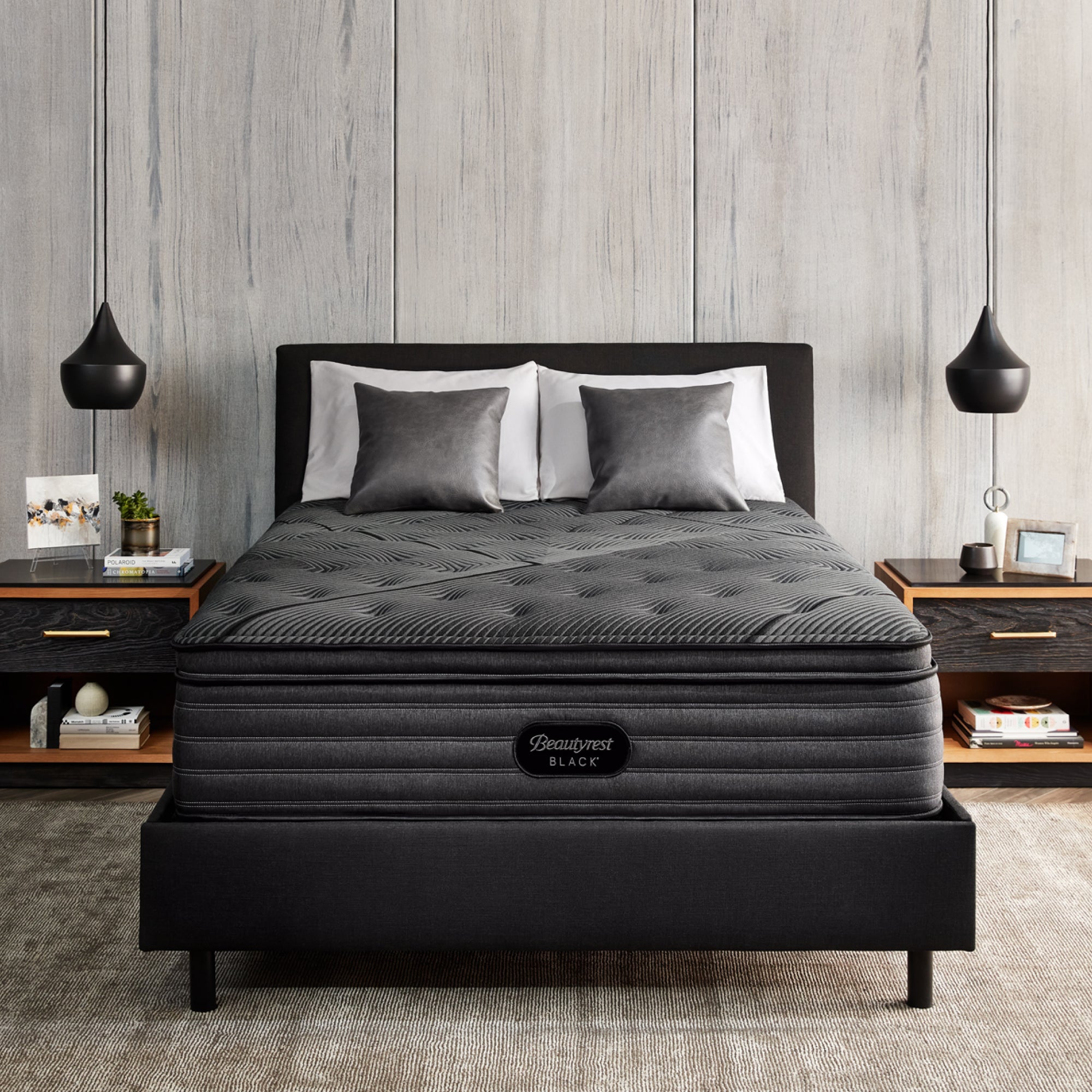 The Beautyrest Black enhanced l-class plush pillow top mattress in a bedroom||series: enhanced l-class || feel: plush pillow top
